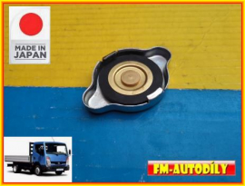 Víčko chladiče 0006 JAPAN Nissan Cabstar 2006 až 2011